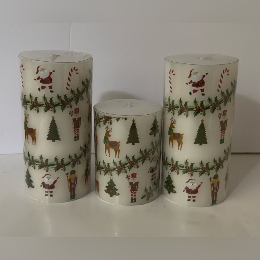 Christmas pillar candles NEW NWT 4in & 6in
3 total Santa reindeer nutcracker